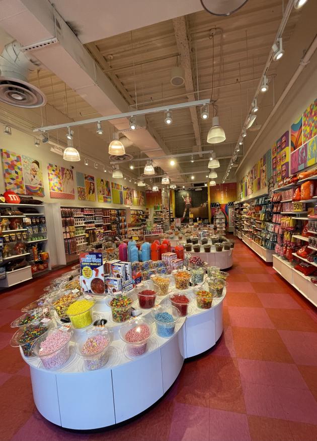 Step into the colorful and whimsical world of It's Sugar.