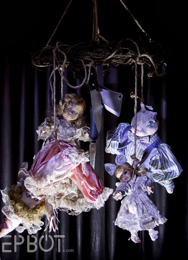 A creepy doll mobile—small details that make historic tours feel unsettling.